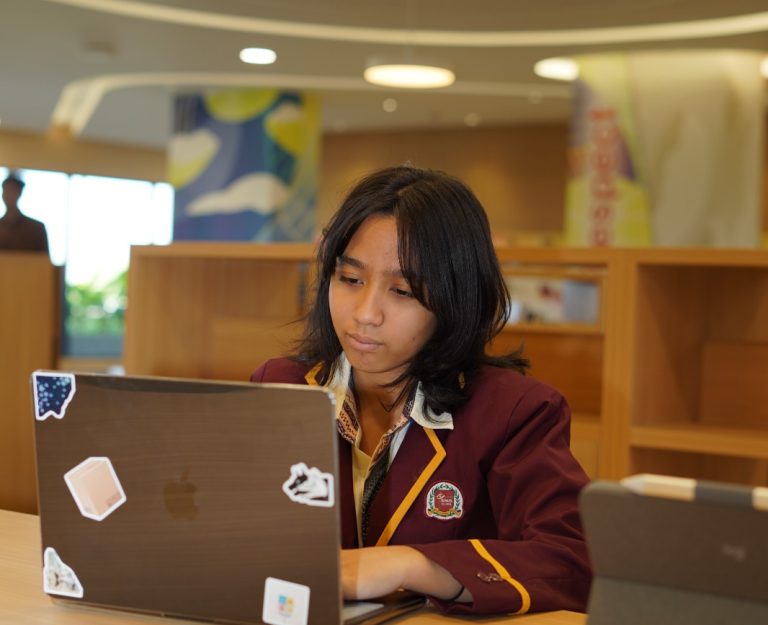 Celebrating Excellence: Caitlyn Shines at the Japan International Science and Mathematics Olympiads